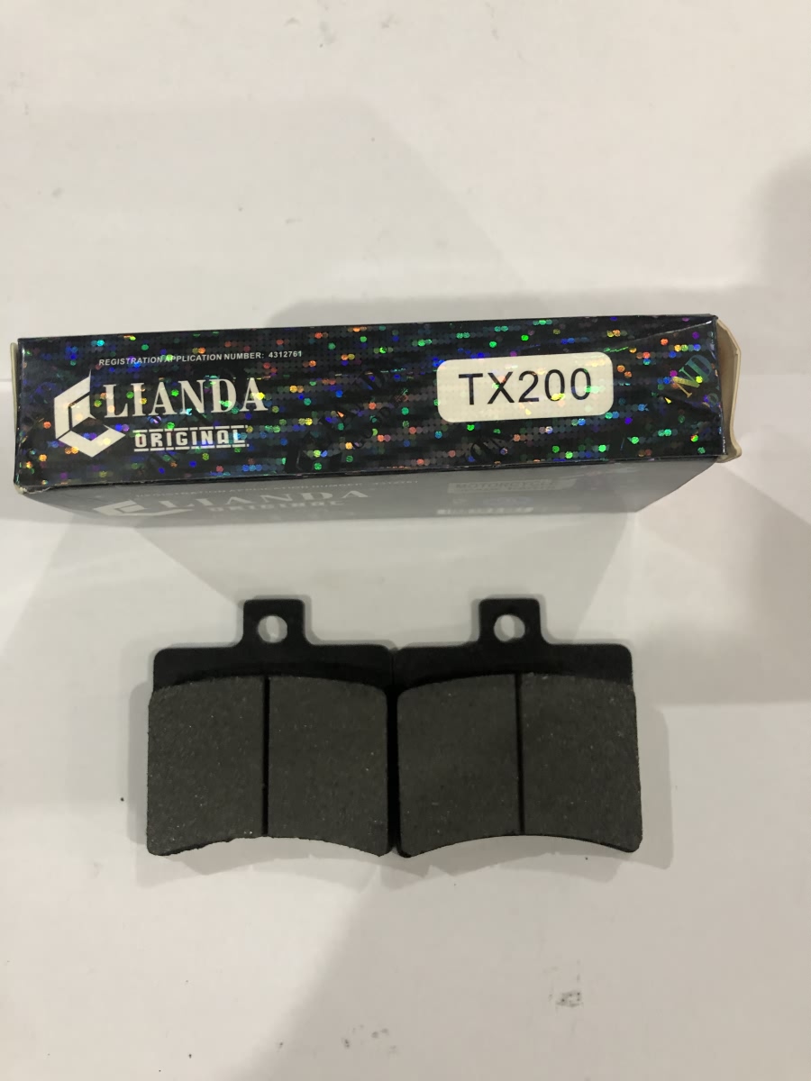 repuesto de moto MOTO71 — PASTILLA TRASERO TX200