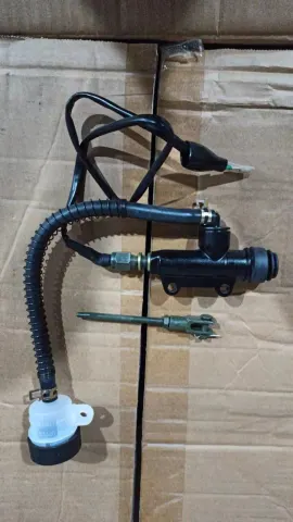 repuesto de moto MOTO71 — BOMBA FRENO TRASERO TX200